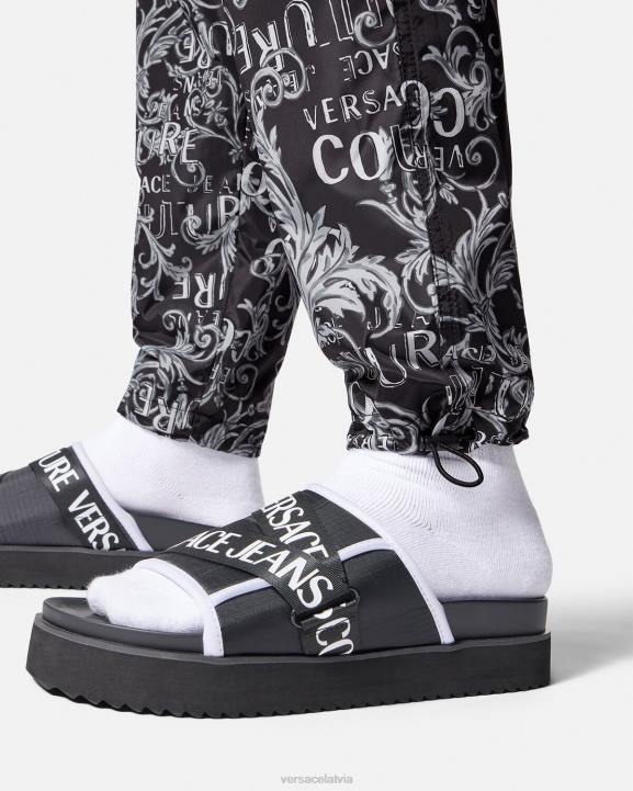 melns un apdrukāts apģērbs Versace 806B2431 vīriešiem ar logotipu couture aukliņu bikses